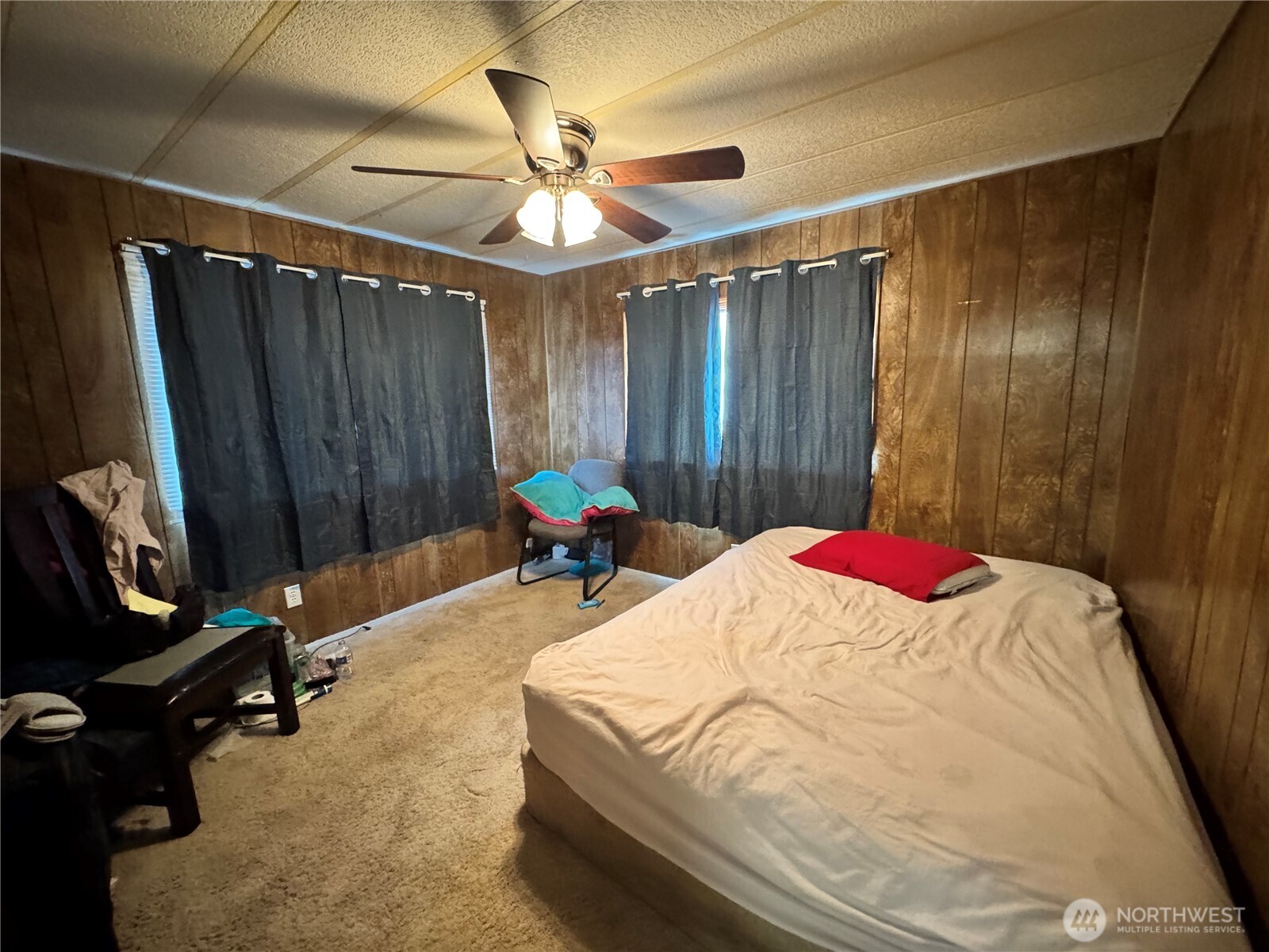 5600 Mt Solo Road, Unit 162 Longview, WA 98632 - Photo 19 of 20 a bed room with a bed and a dresser