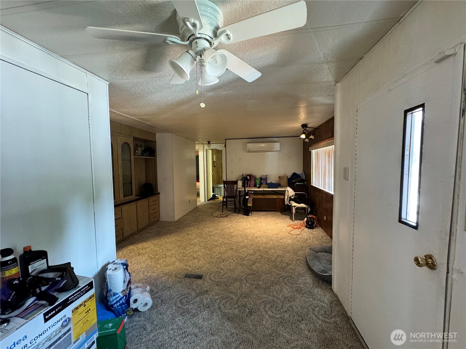 5600 Mt Solo Road, Unit 162 Longview, WA 98632 - Photo 6 of 20 a living room with furniture and a flat screen tv
