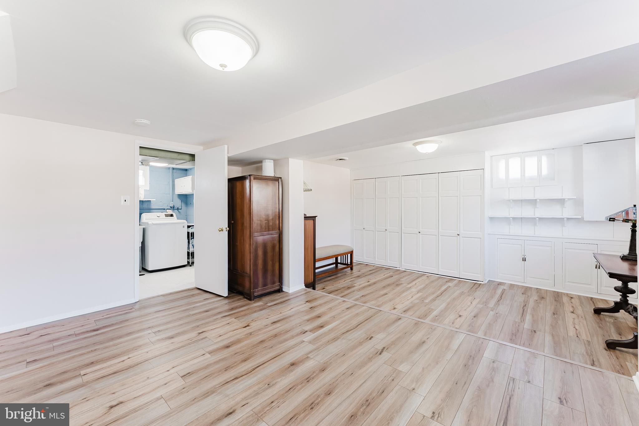 5937 Atteentee Road Springfield, VA 22150 - Photo 21 of 44 a view of a room with wooden floor and windows