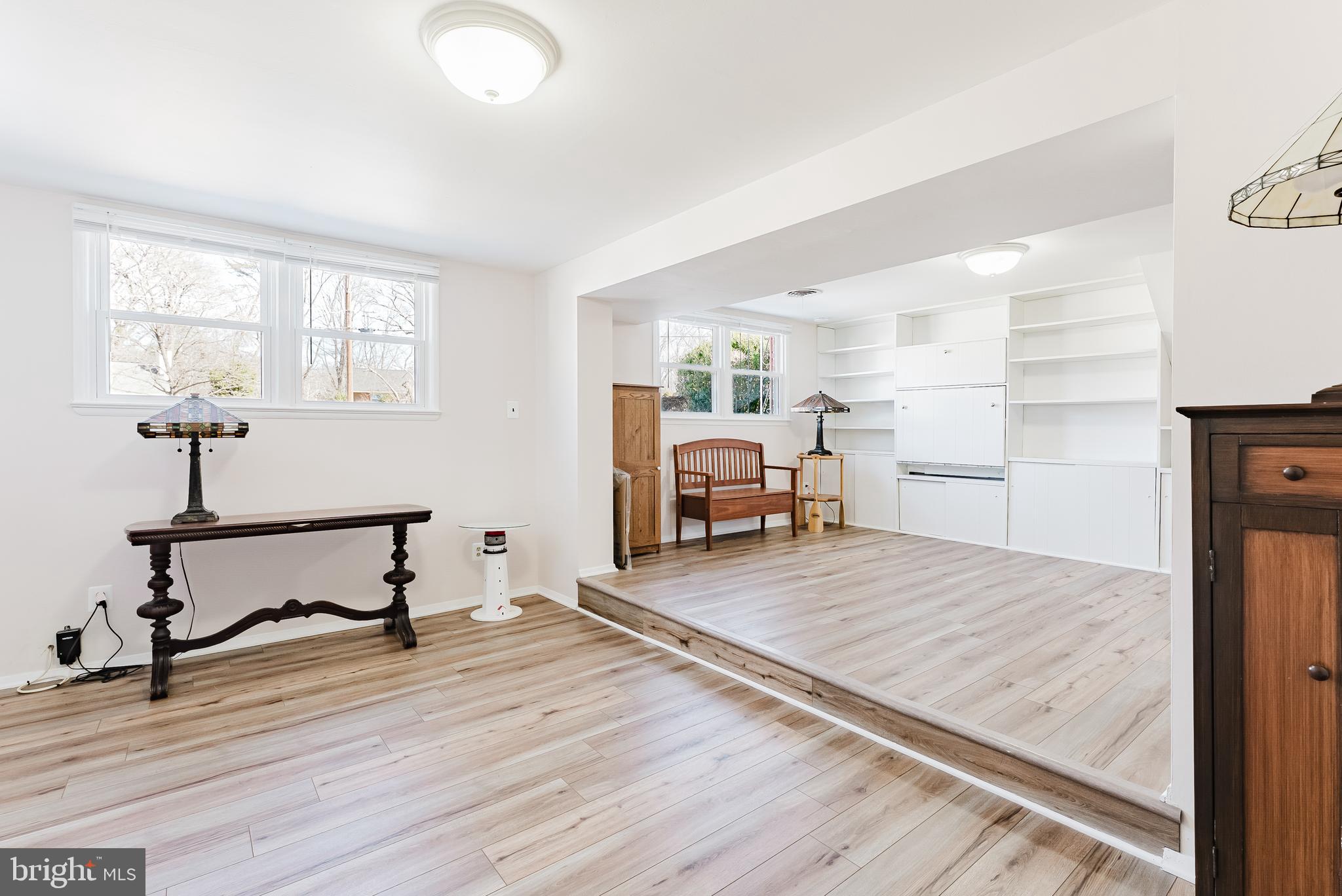 5937 Atteentee Road Springfield, VA 22150 - Photo 23 of 44 a view of a livingroom with furniture and wooden floor