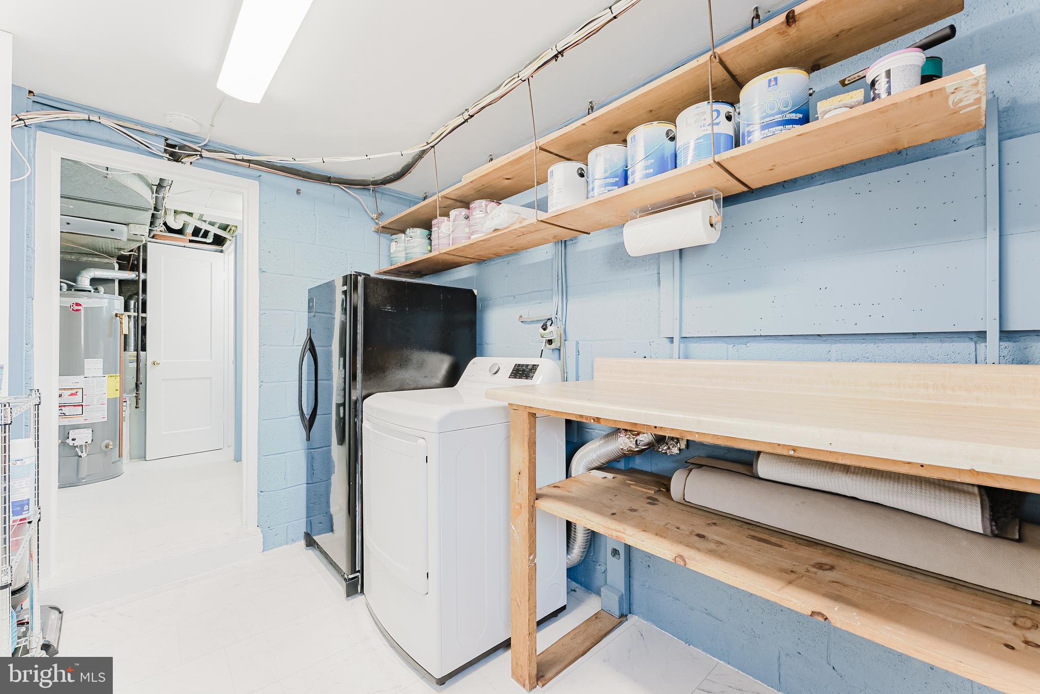 5937 Atteentee Road Springfield, VA 22150 - Photo 27 of 44 a utility room with dryer and washer