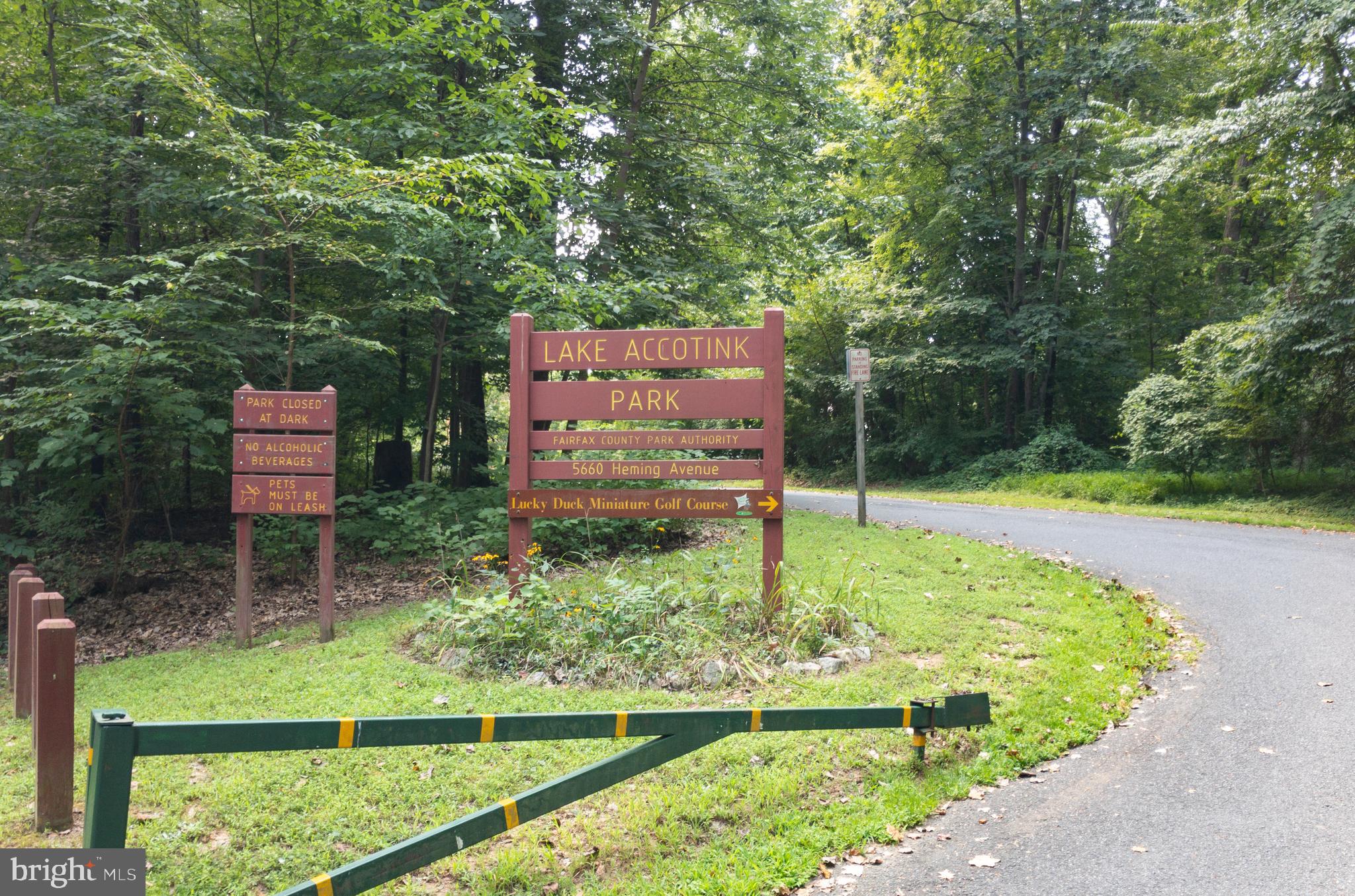 5937 Atteentee Road Springfield, VA 22150 - Photo 41 of 44 a sign board with a yard