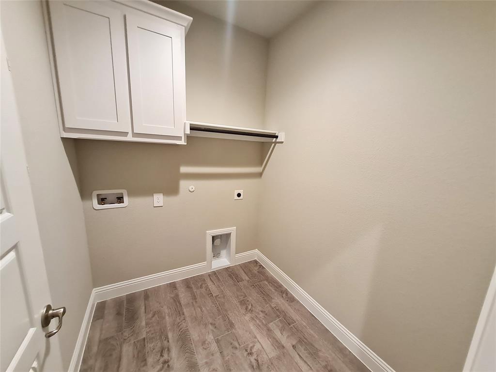 1604 Buzzard Road Denton, TX 76205 - Photo 21 of 22 Laundry Room with Washer & Electric Dryer Hook-up.