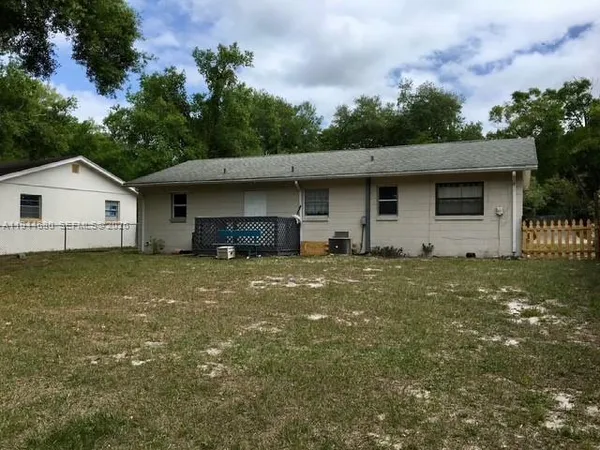 a front view of house with garden