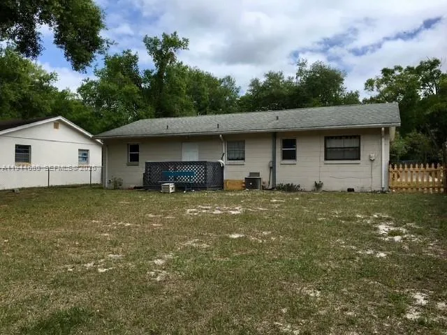 a front view of house with garden