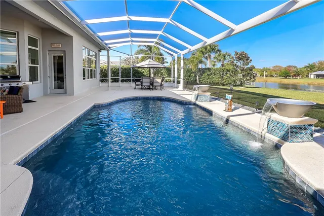 a view of a swimming pool with a patio