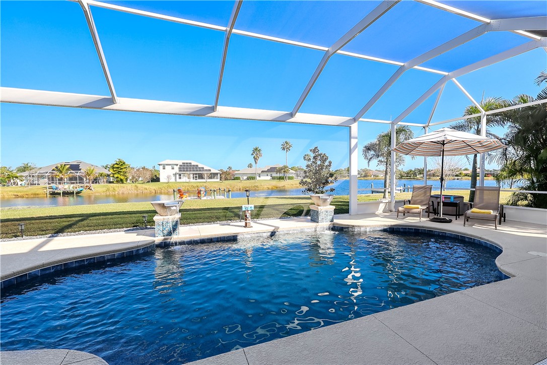 607 Yearling Trail Sebastian, FL 32958 - Photo 30 of 33 a living room with lots of furniture and a table