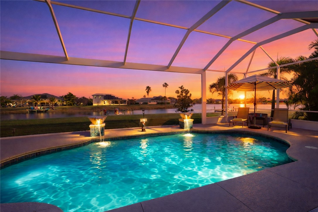 607 Yearling Trail Sebastian, FL 32958 - Photo 3 of 33 a view of a swimming pool with an outdoor seating
