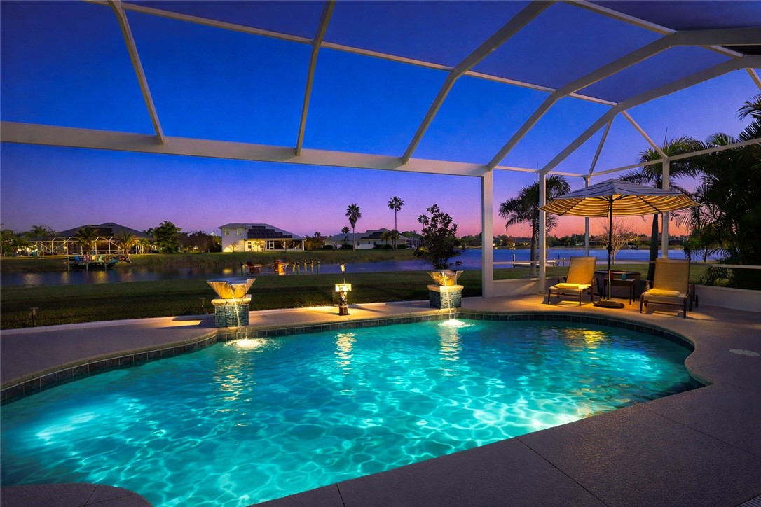 607 Yearling Trail Sebastian, FL 32958 - Photo 32 of 33 a view of swimming pool with outdoor seating