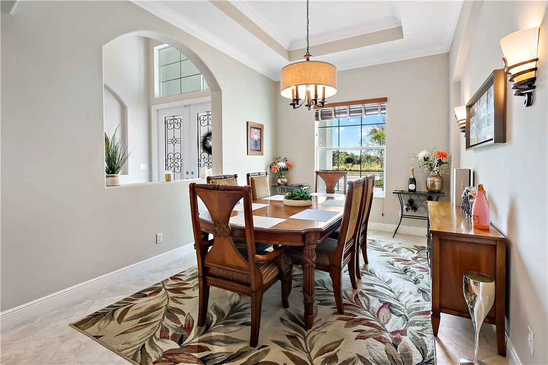607 Yearling Trail Sebastian, FL 32958 - Photo 6 of 33 a view of a dining room with furniture