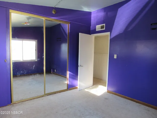 a view of a livingroom with a staircase