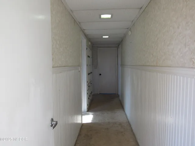 a en suite bathroom with a glass shower door