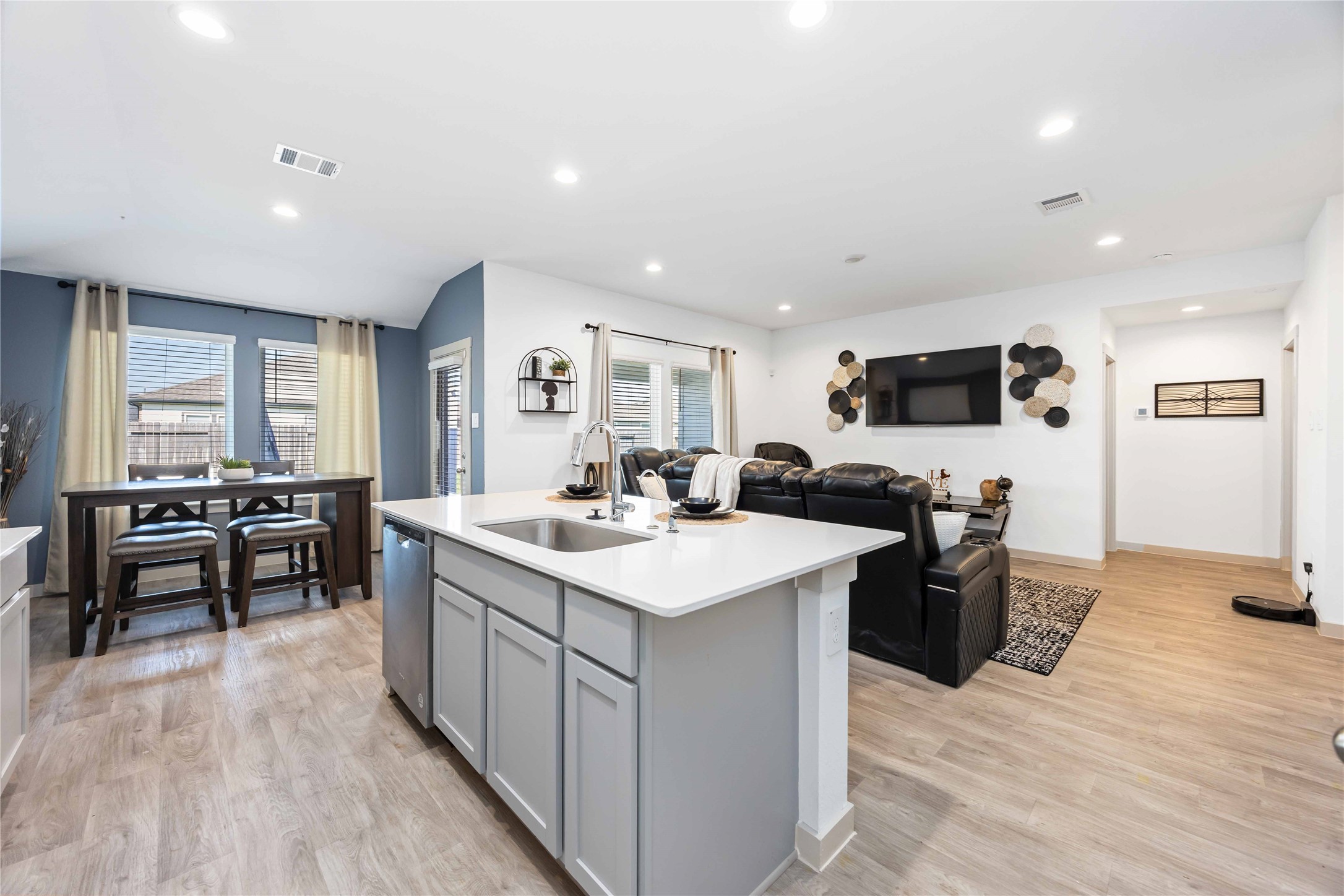 7826 Cattleman Vly Drive Rosharon, TX 77583 - Photo 11 of 29 a kitchen with counter top space a sink appliances and cabinets