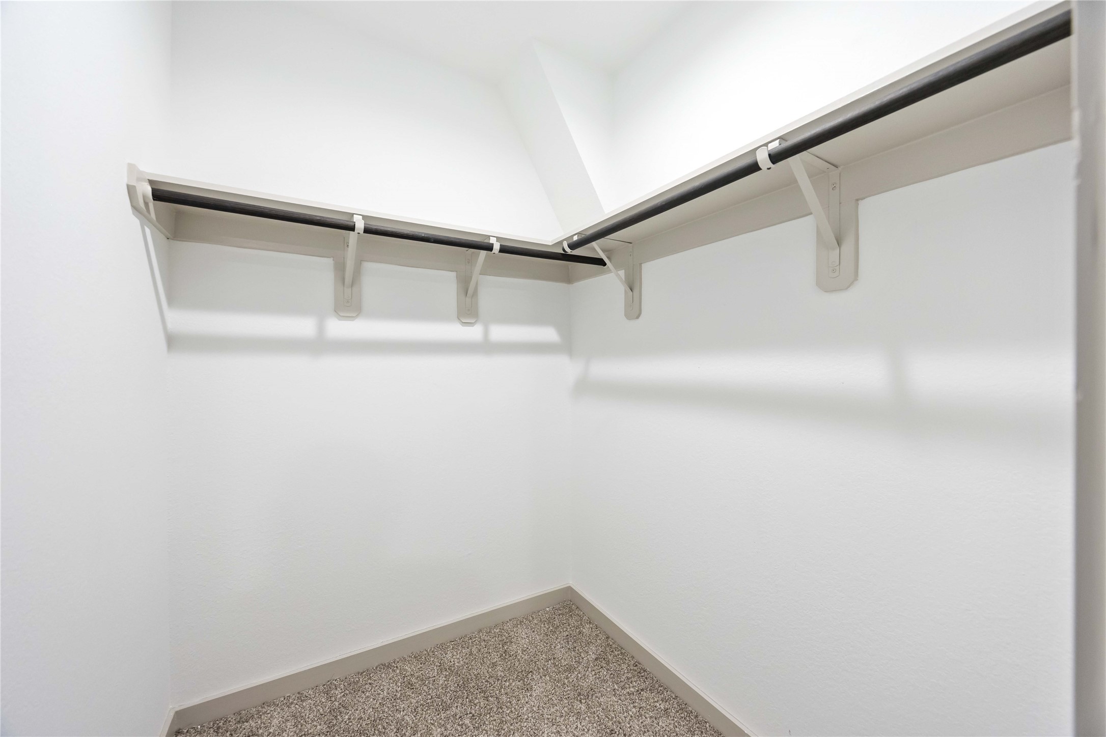 7826 Cattleman Vly Drive Rosharon, TX 77583 - Photo 25 of 29 a view of an empty walk in closet
