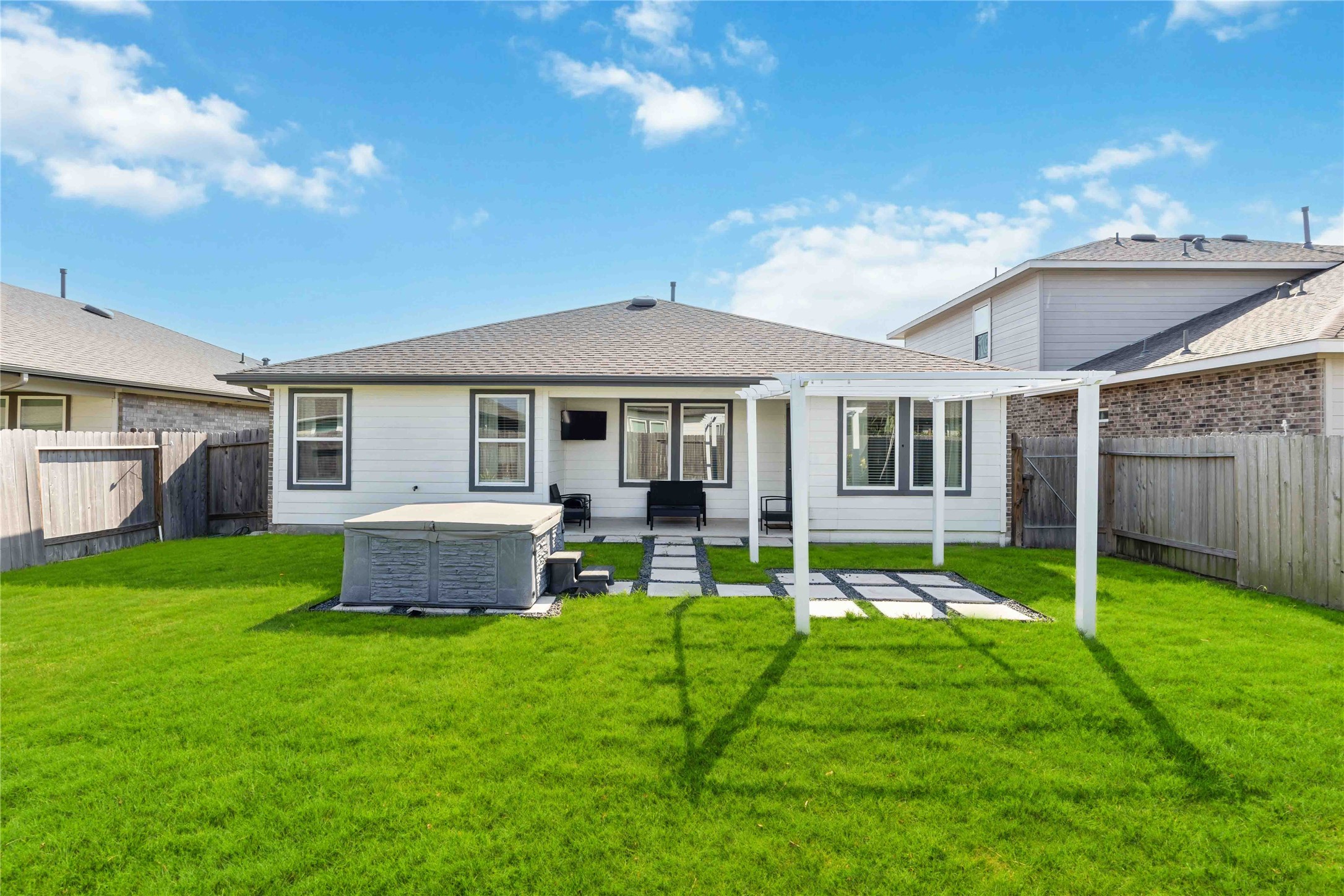 7826 Cattleman Vly Drive Rosharon, TX 77583 - Photo 27 of 29 a view of a house with a yard and chairs