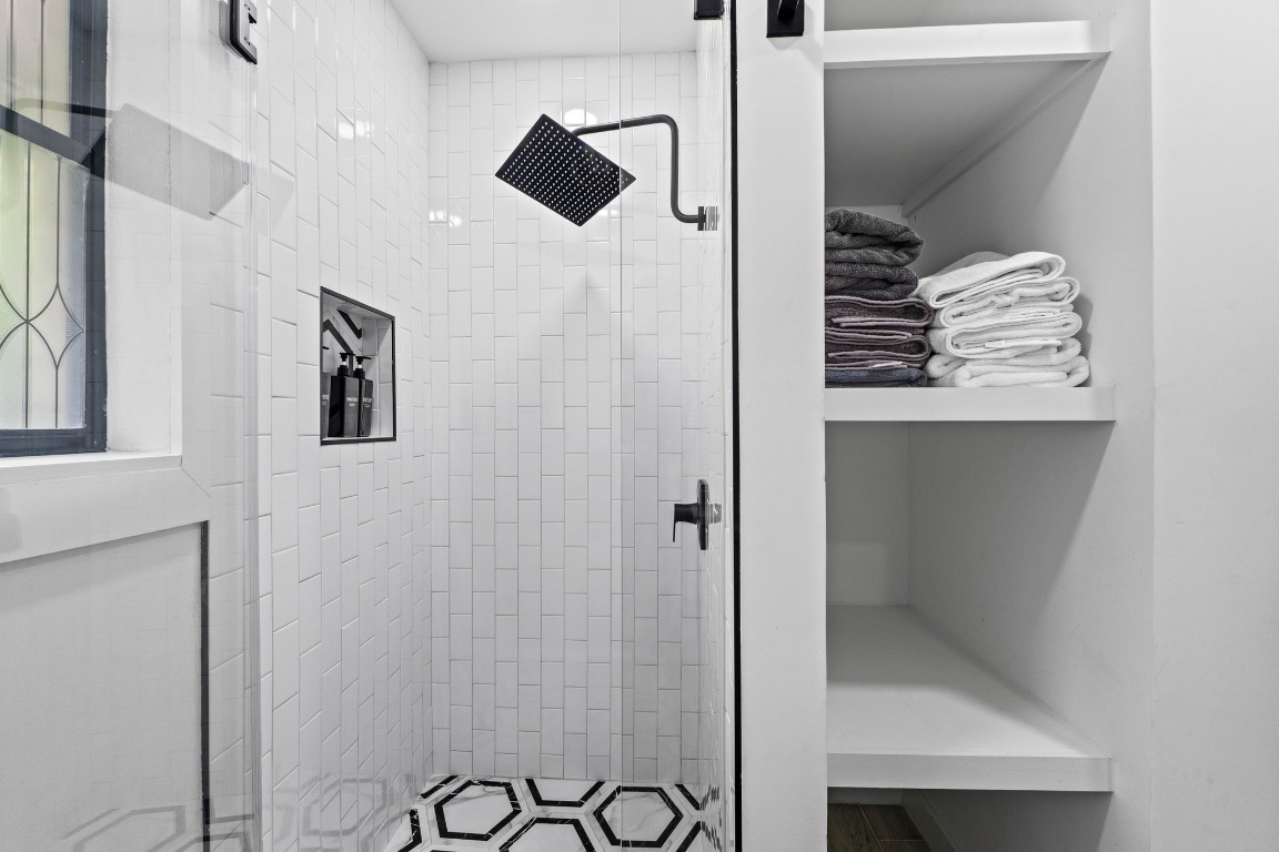 3520 Highland View Drive Austin, TX 78731 - Photo 23 of 38 a bathroom with a shower and a sink