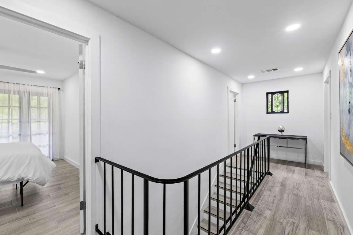 3520 Highland View Drive Austin, TX 78731 - Photo 28 of 38 a view of entryway with wooden floor