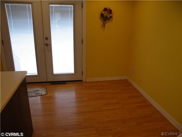 9609 Krause Road Chesterfield, VA 23832 - Photo 5 of 17 a view of room with window and wooden floor
