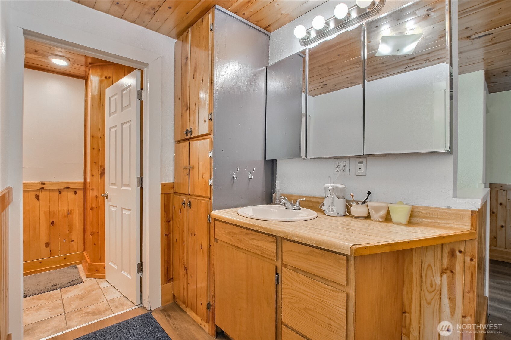 13610 Southeast 288th Street Kent, WA 98042 - Photo 30 of 32 a bathroom with a sink and a mirror