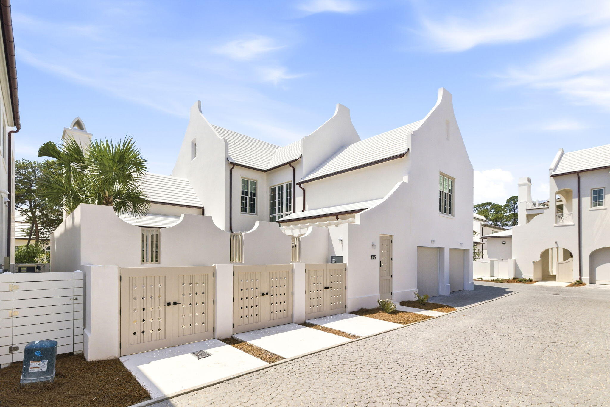 133 Whalebone Alley Inlet Beach, FL 32461 - Photo 4 of 18 a view of a house with a garage