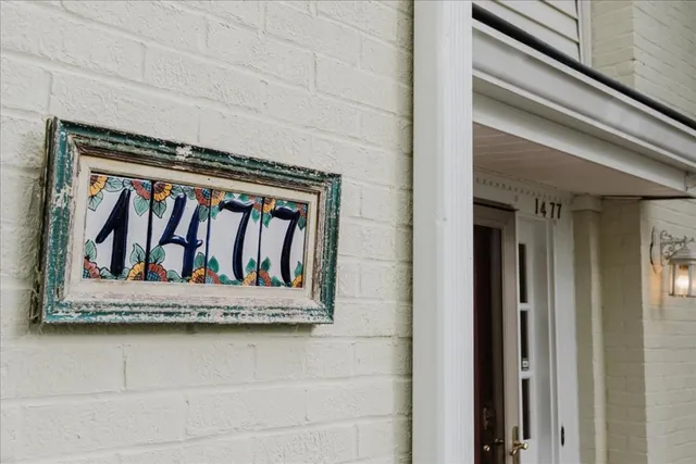 a view of a door and a window