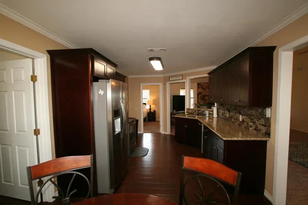 a lobby with furniture and flat screen tv