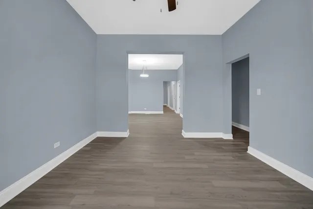 a view of a livingroom with wooden floor