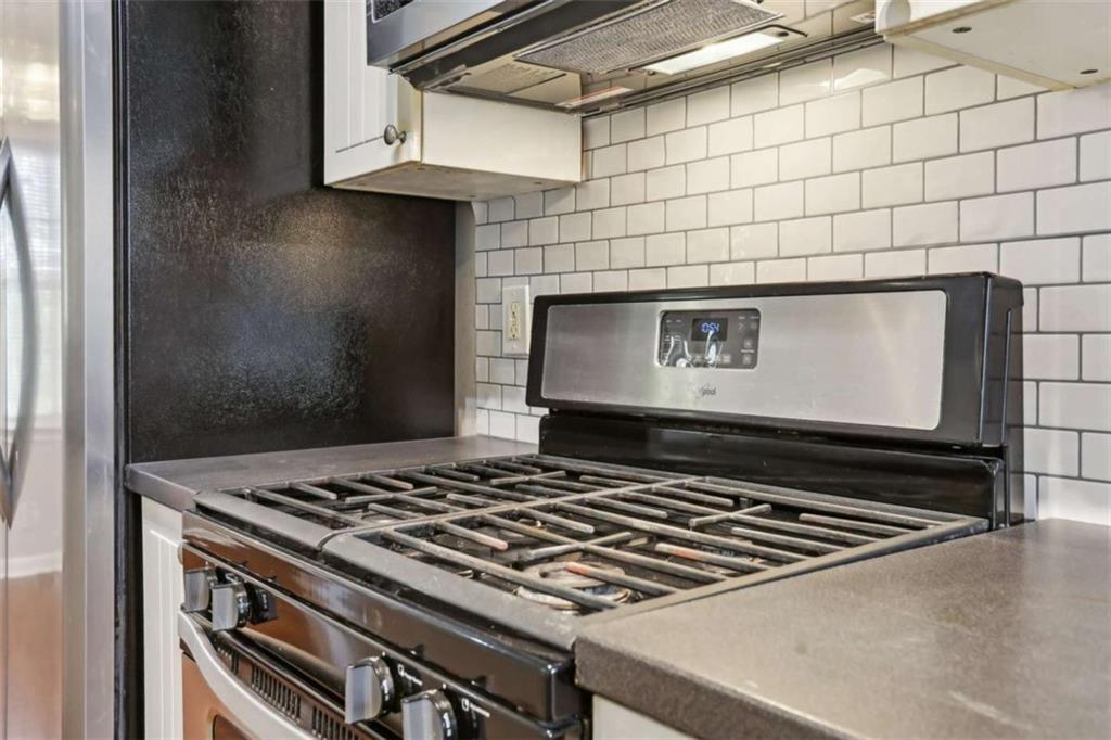 1840 Camellia Drive Decatur, GA 30032 - Photo 14 of 28 a stove top oven sitting inside of a kitchen