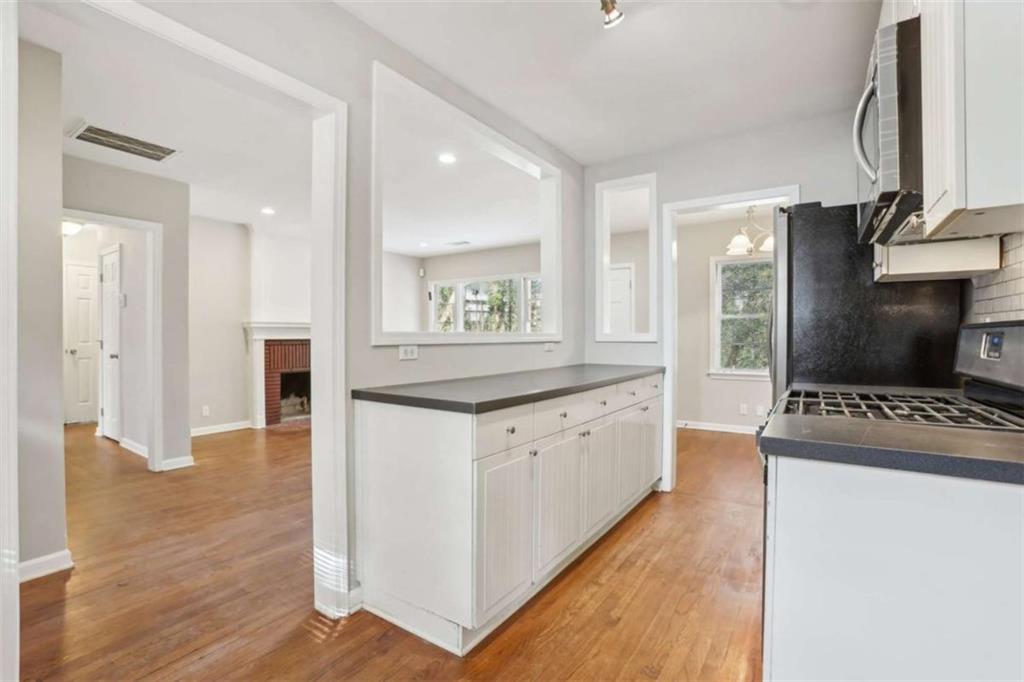 1840 Camellia Drive Decatur, GA 30032 - Photo 15 of 28 a kitchen with stainless steel appliances granite countertop a refrigerator a stove and a sink