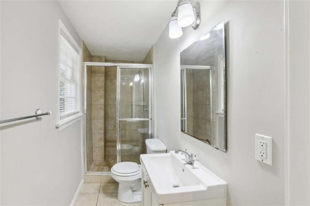 1840 Camellia Drive Decatur, GA 30032 - Photo 16 of 28 a bathroom with a sink toilet and shower