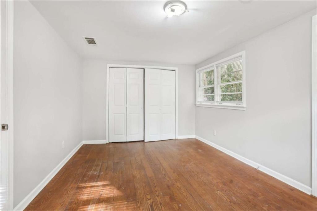 1840 Camellia Drive Decatur, GA 30032 - Photo 17 of 28 an empty room with windows