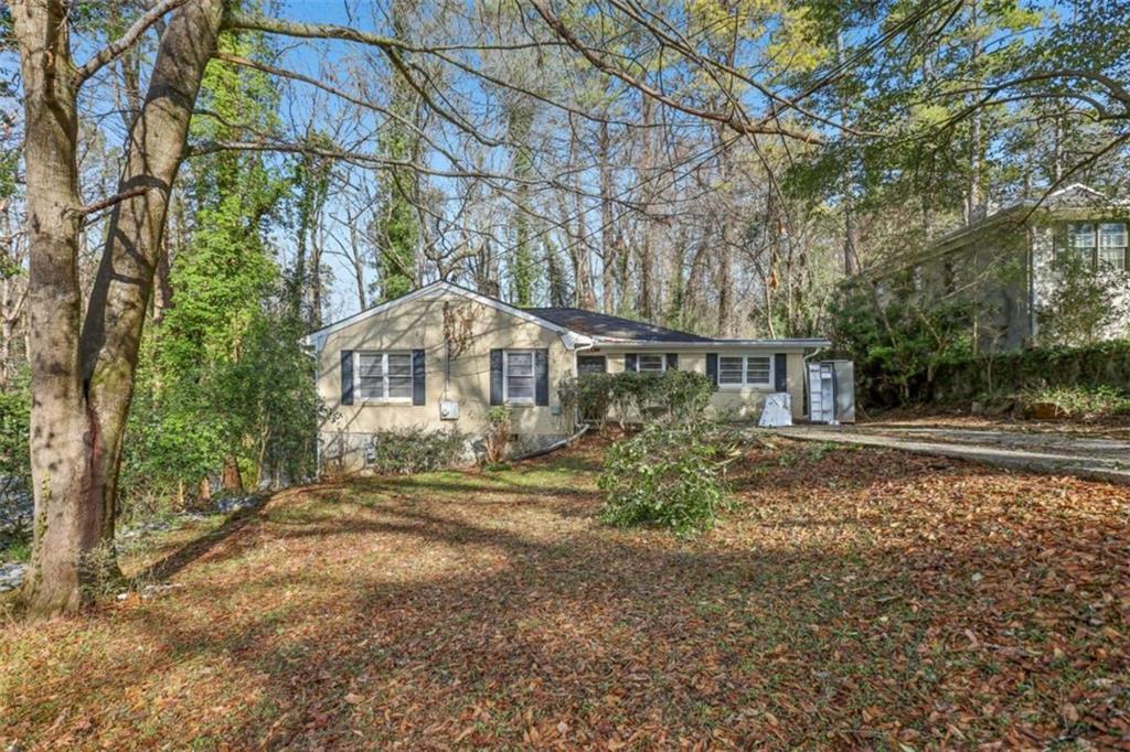 1840 Camellia Drive Decatur, GA 30032 - Photo 2 of 28 a front view of a house with garden