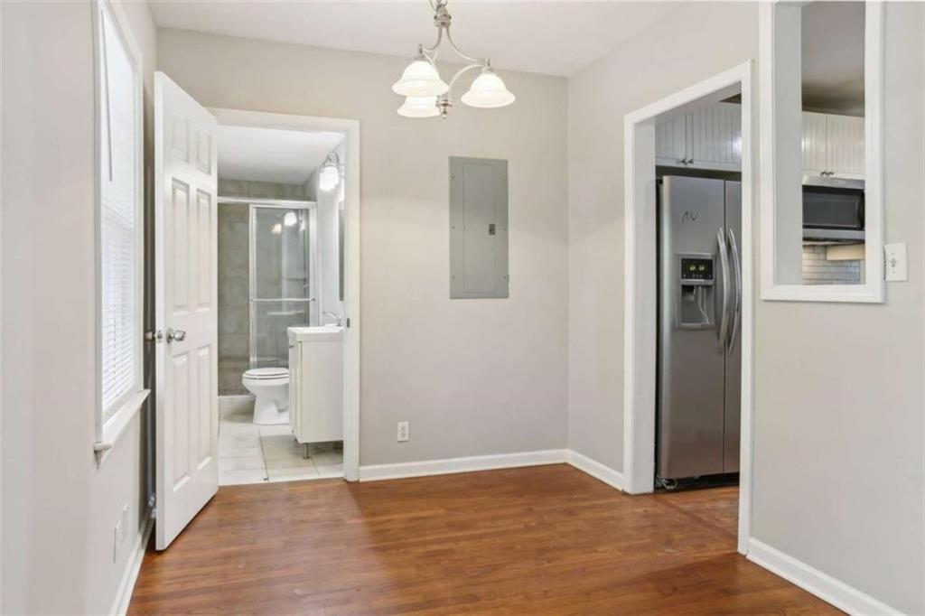 1840 Camellia Drive Decatur, GA 30032 - Photo 9 of 28 wooden floor in an empty room and a bathroom