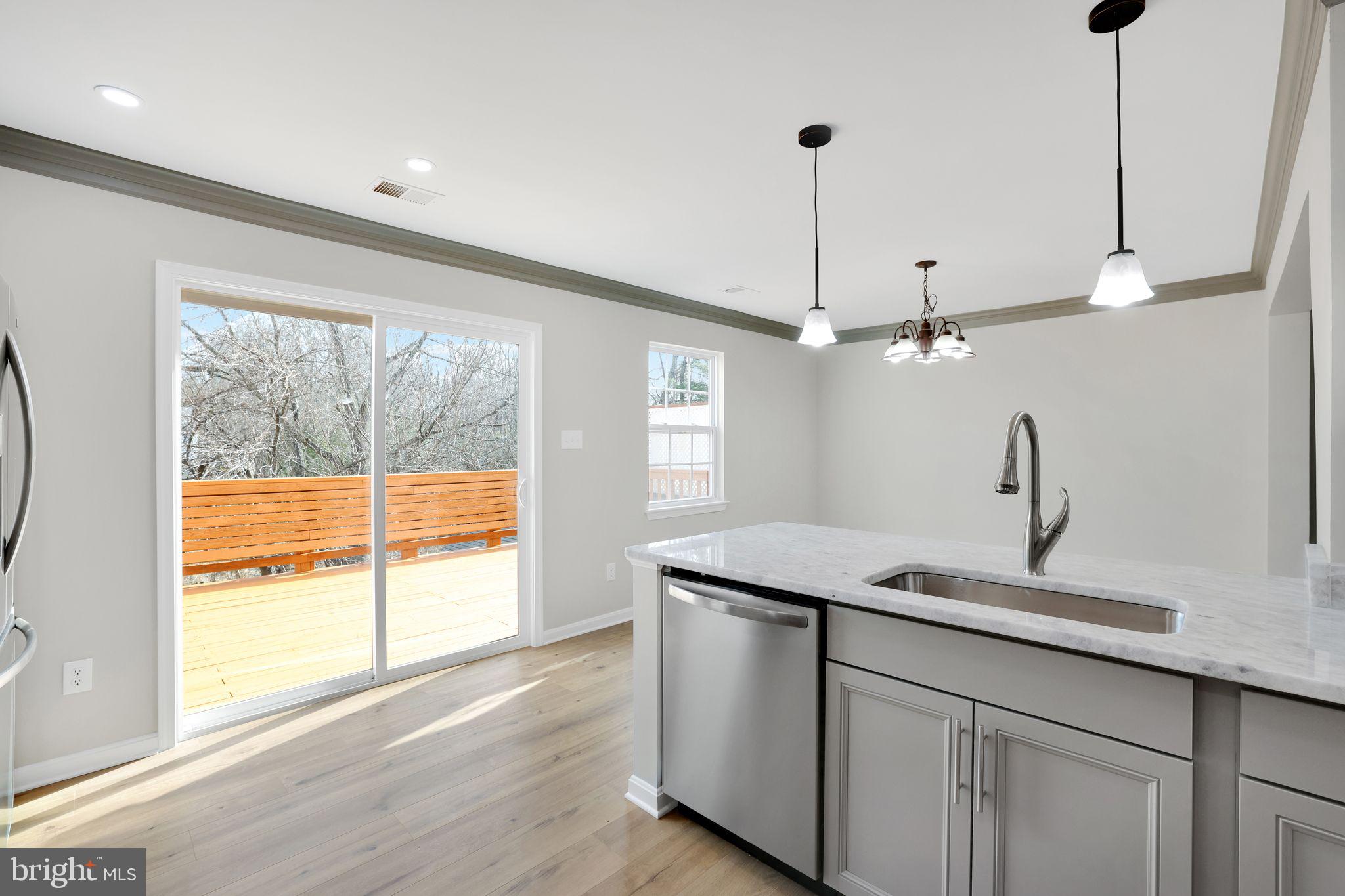 815 Cedar Court La Plata, MD 20646 - Photo 16 of 43 a kitchen with a sink and window