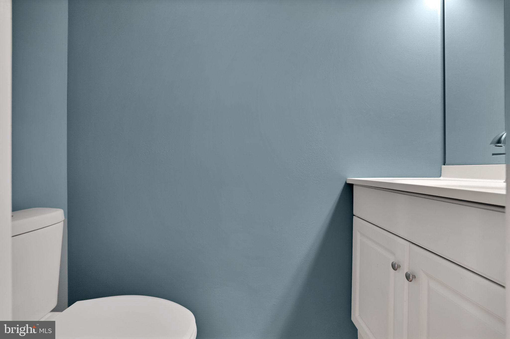 815 Cedar Court La Plata, MD 20646 - Photo 17 of 43 a bathroom with a toilet sink and vanity