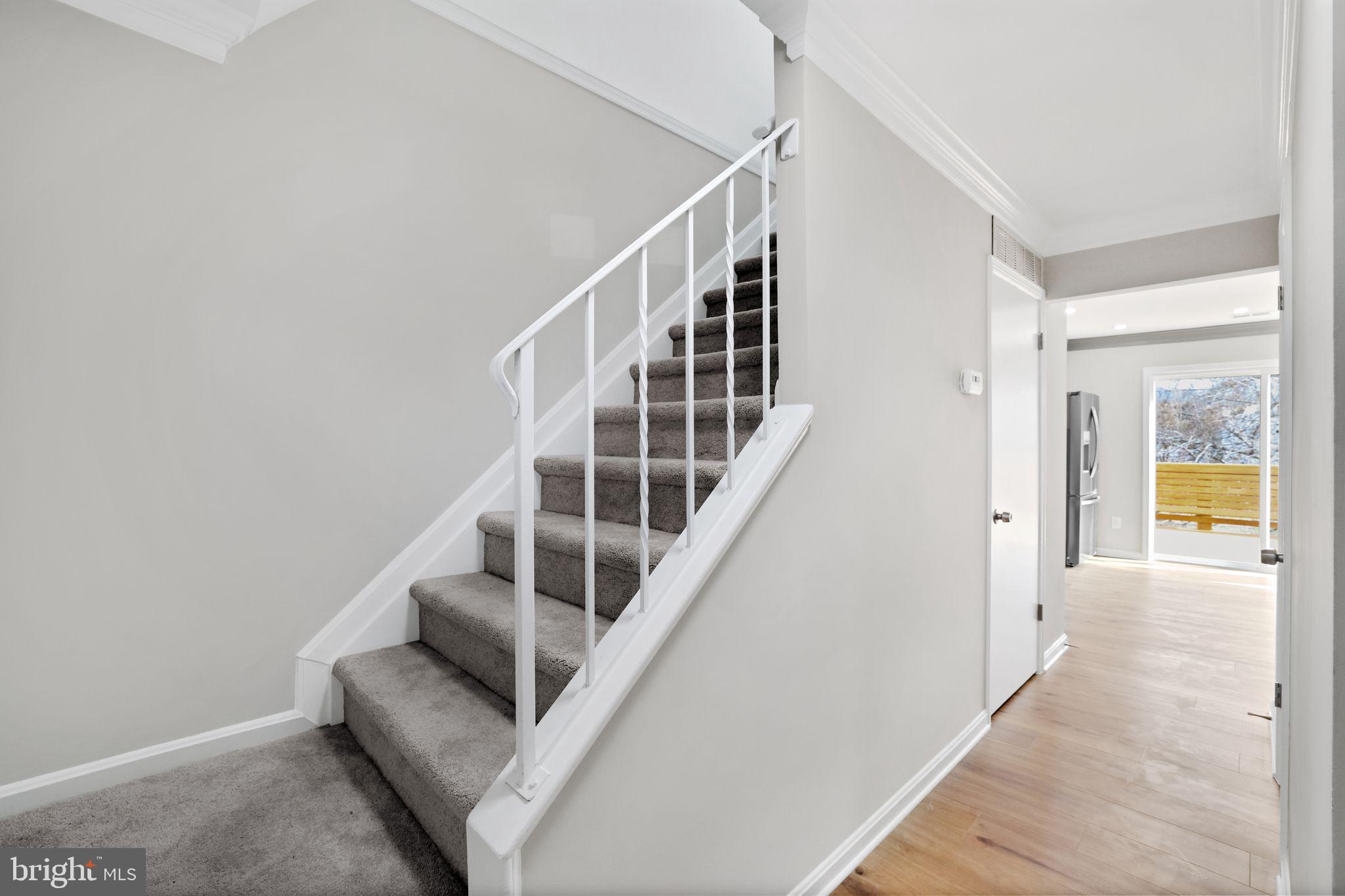 815 Cedar Court La Plata, MD 20646 - Photo 18 of 43 a view of entryway and hall with wooden floor