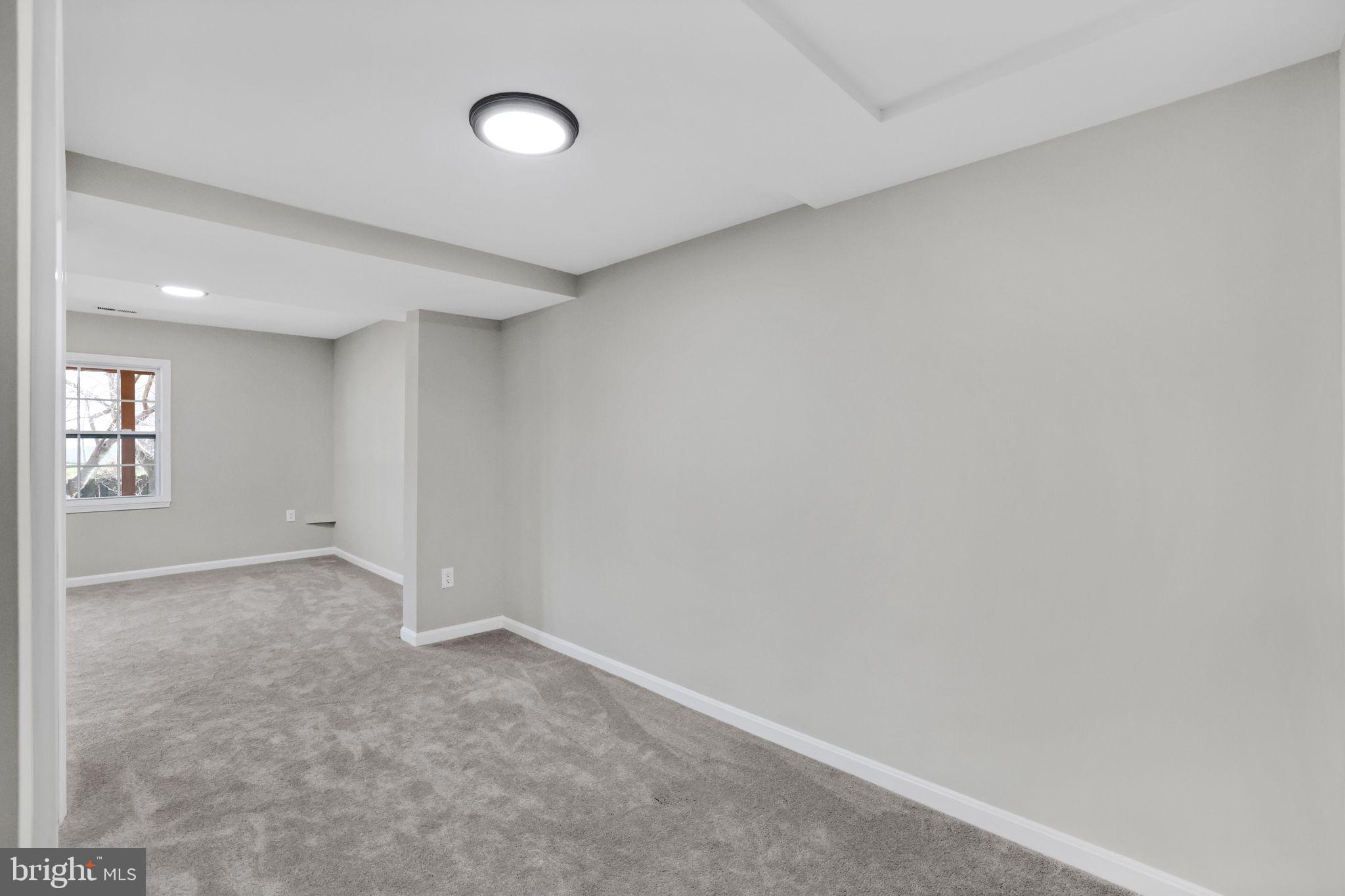 815 Cedar Court La Plata, MD 20646 - Photo 29 of 43 an empty room with windows and entrance