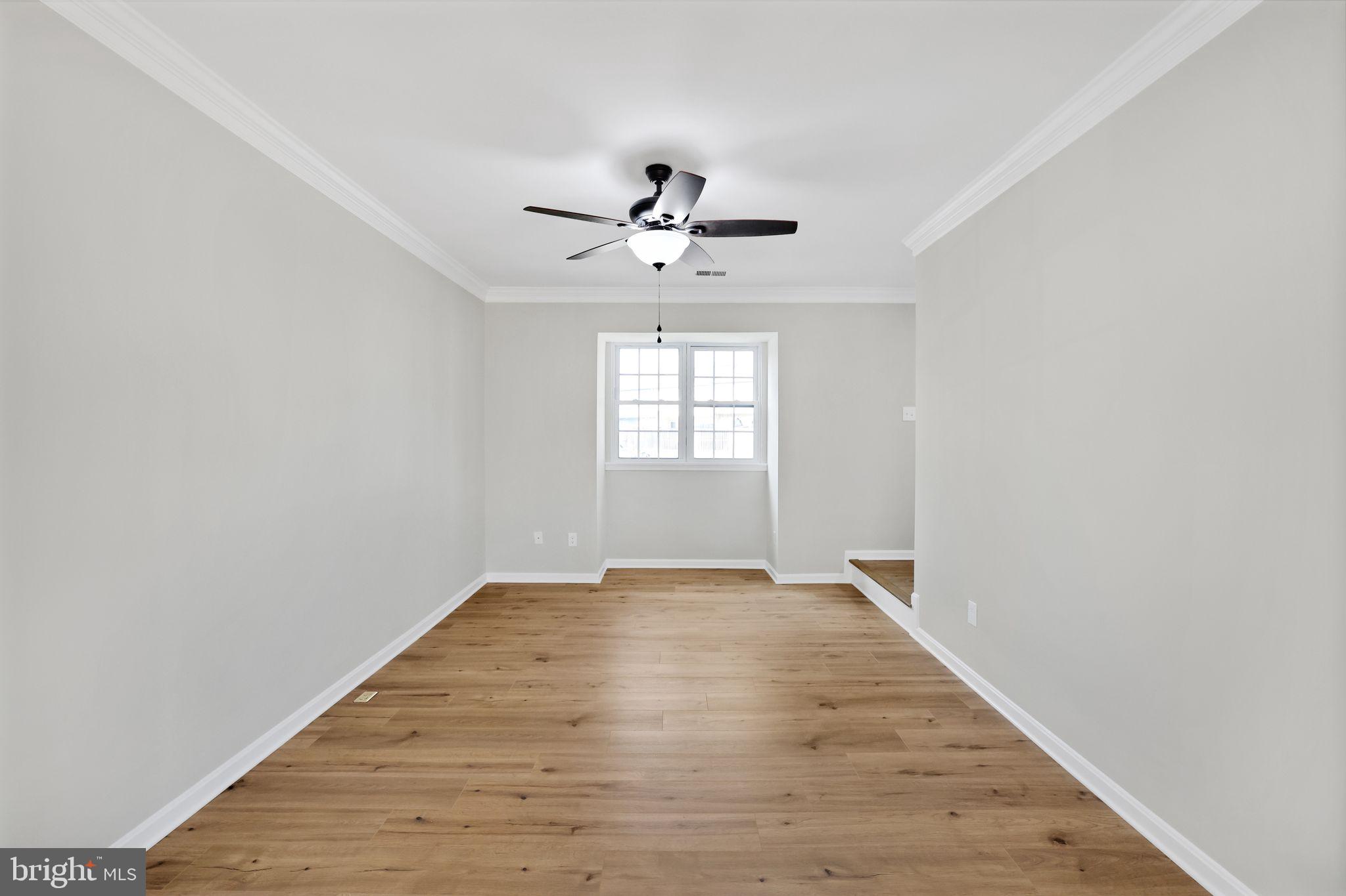 815 Cedar Court La Plata, MD 20646 - Photo 6 of 43 wooden floor in an empty room with a window
