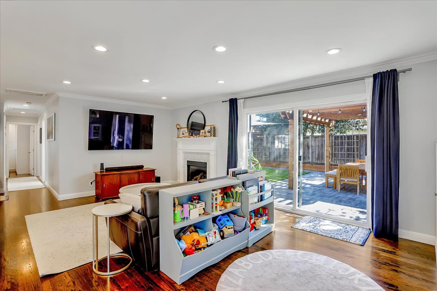 1220 Redcliff Drive San Jose, CA 95118 - Photo 12 of 39 a living room with furniture and a floor to ceiling window