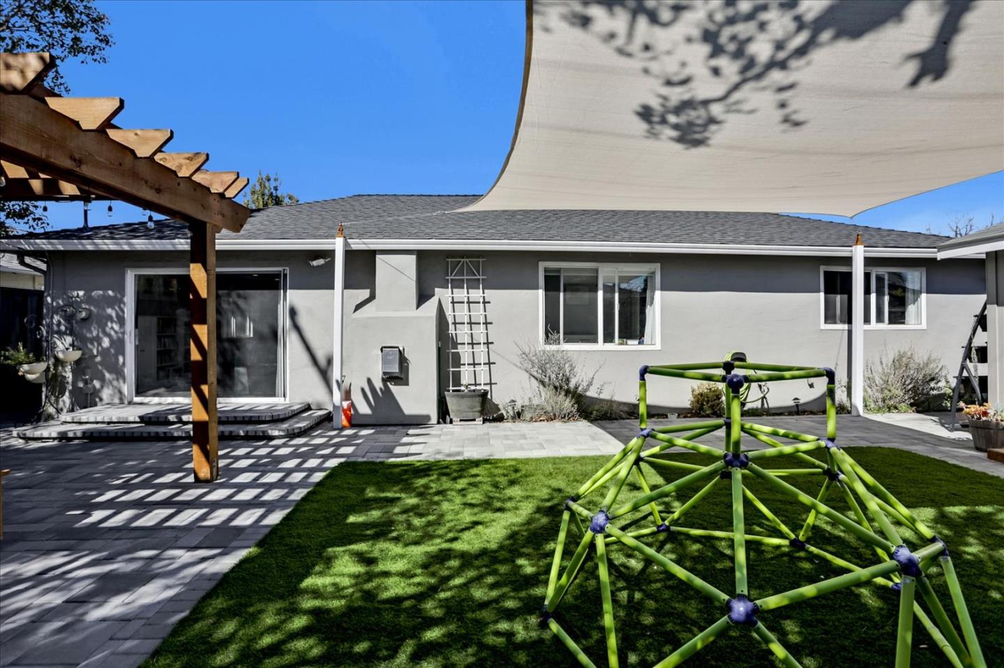 1220 Redcliff Drive San Jose, CA 95118 - Photo 35 of 39 a view of a backyard with table and chairs