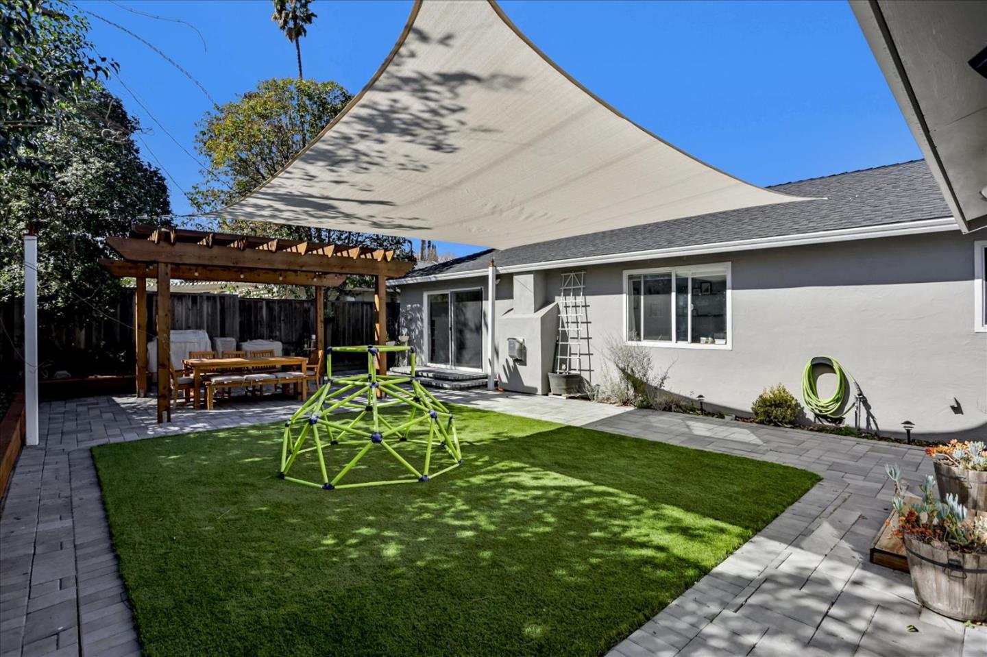 1220 Redcliff Drive San Jose, CA 95118 - Photo 36 of 39 a view of a house with backyard porch and sitting area