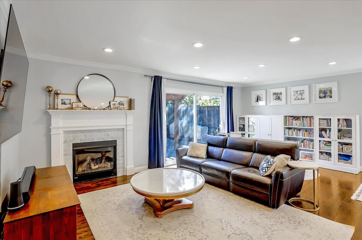 1220 Redcliff Drive San Jose, CA 95118 - Photo 9 of 39 a living room with furniture and a fireplace