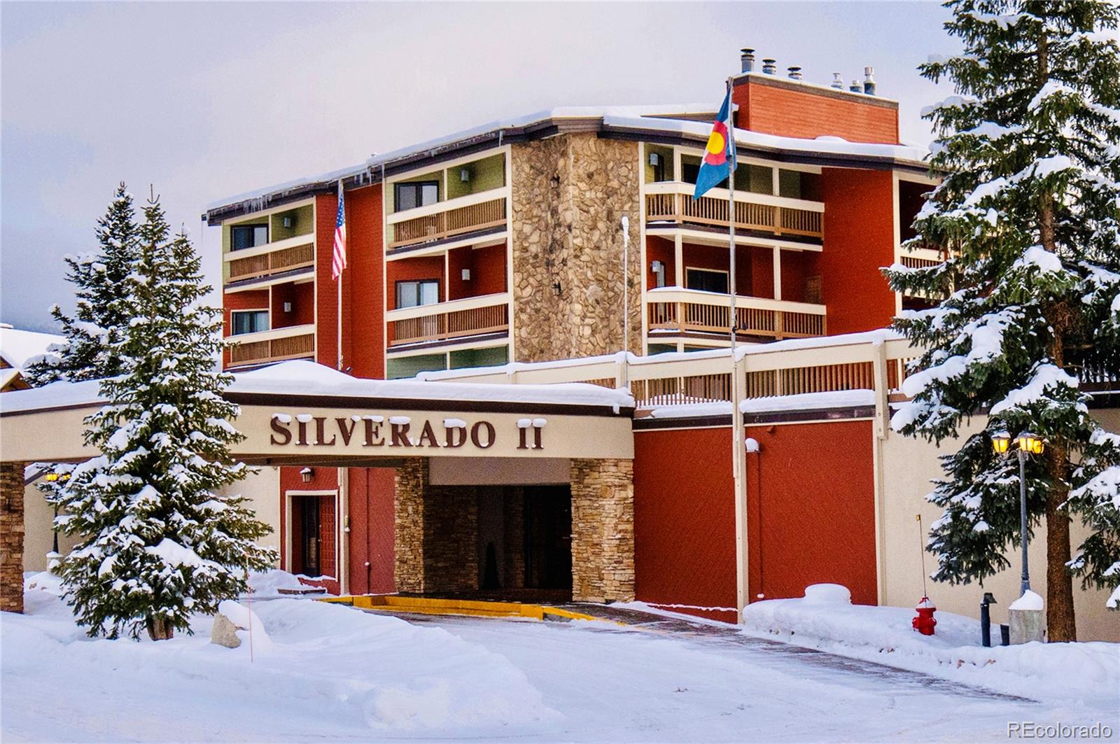 490 Kings Crossing Road, Unit 321 Winter Park, CO 80482 - Photo 2 of 46 a front view of multi story residential apartment building