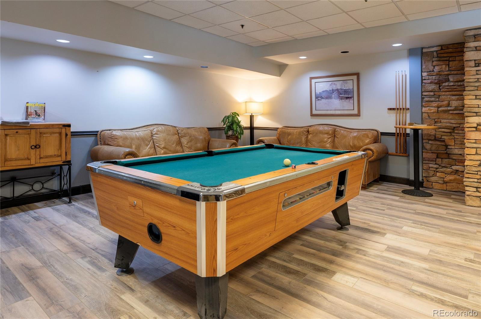 490 Kings Crossing Road, Unit 321 Winter Park, CO 80482 - Photo 32 of 46 a room with furniture and a flat screen tv