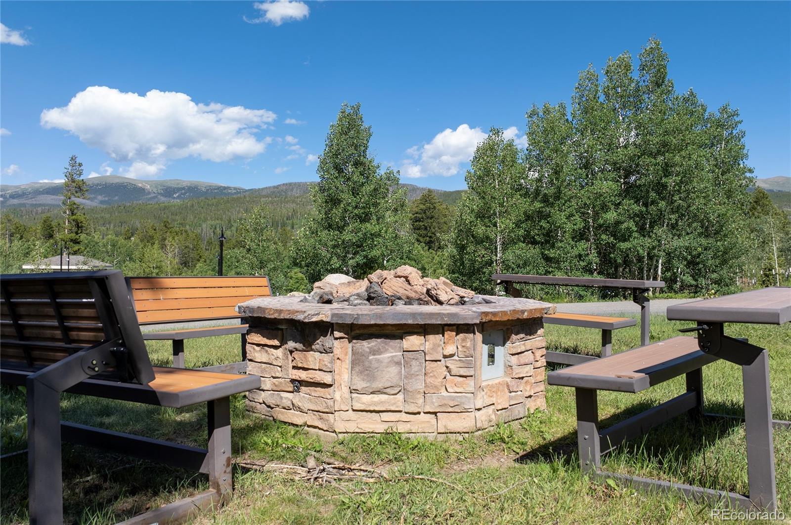 490 Kings Crossing Road, Unit 321 Winter Park, CO 80482 - Photo 35 of 46 a view of a chairs and table in the terrace