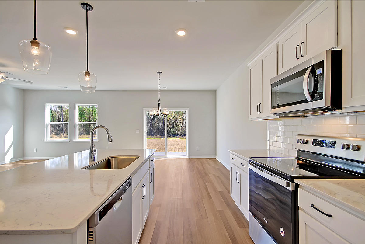 224 Cypress Plantation Road Moncks Corner, SC 29461 - Photo 21 of 35 Kitchen to dining area