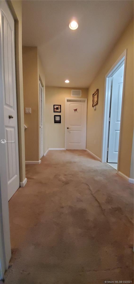 14140 Southwest 275th Street, Unit 1 Homestead, FL 33032 - Photo 15 of 25 a view of an empty room