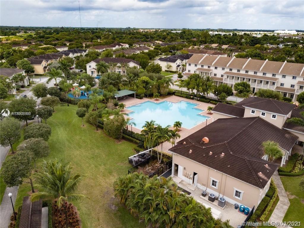 14140 Southwest 275th Street, Unit 1 Homestead, FL 33032 - Photo 23 of 25 an aerial view of residential houses with outdoor space