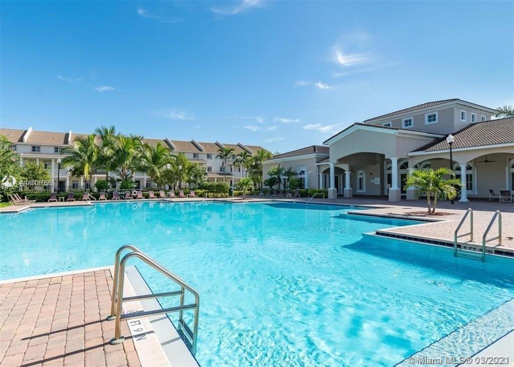 14140 Southwest 275th Street, Unit 1 Homestead, FL 33032 - Photo 24 of 25 a view of house with swimming pool yard and outdoor seating