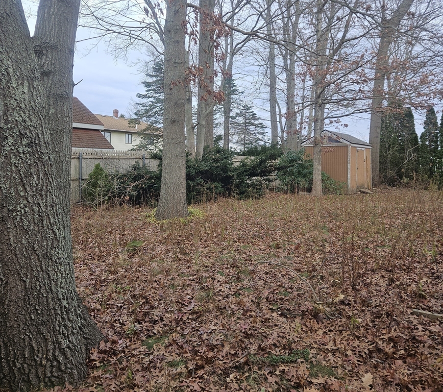 664 Norman Street Fall River, MA 02721 - Photo 12 of 12 a view of a house with a yard